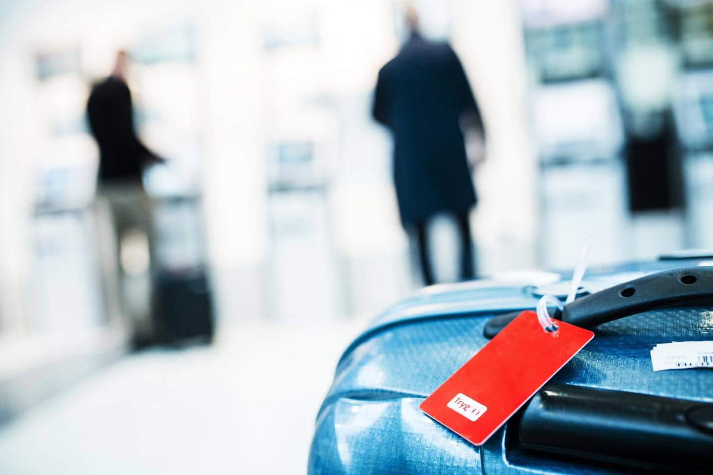 Erhvervsrejseforsikring, kuffert i lufthavn